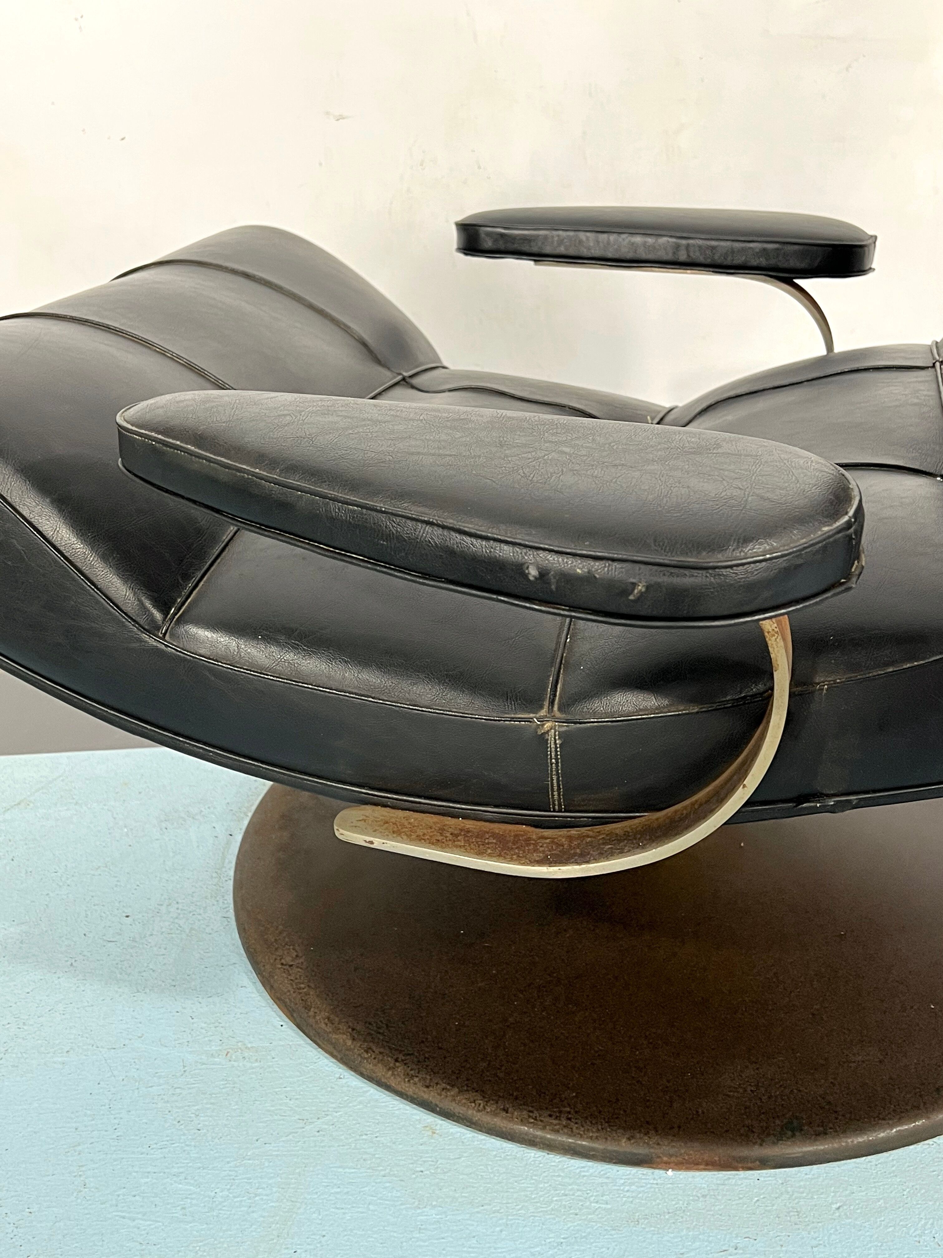 Vintage Italian black swivel armchair from 60s