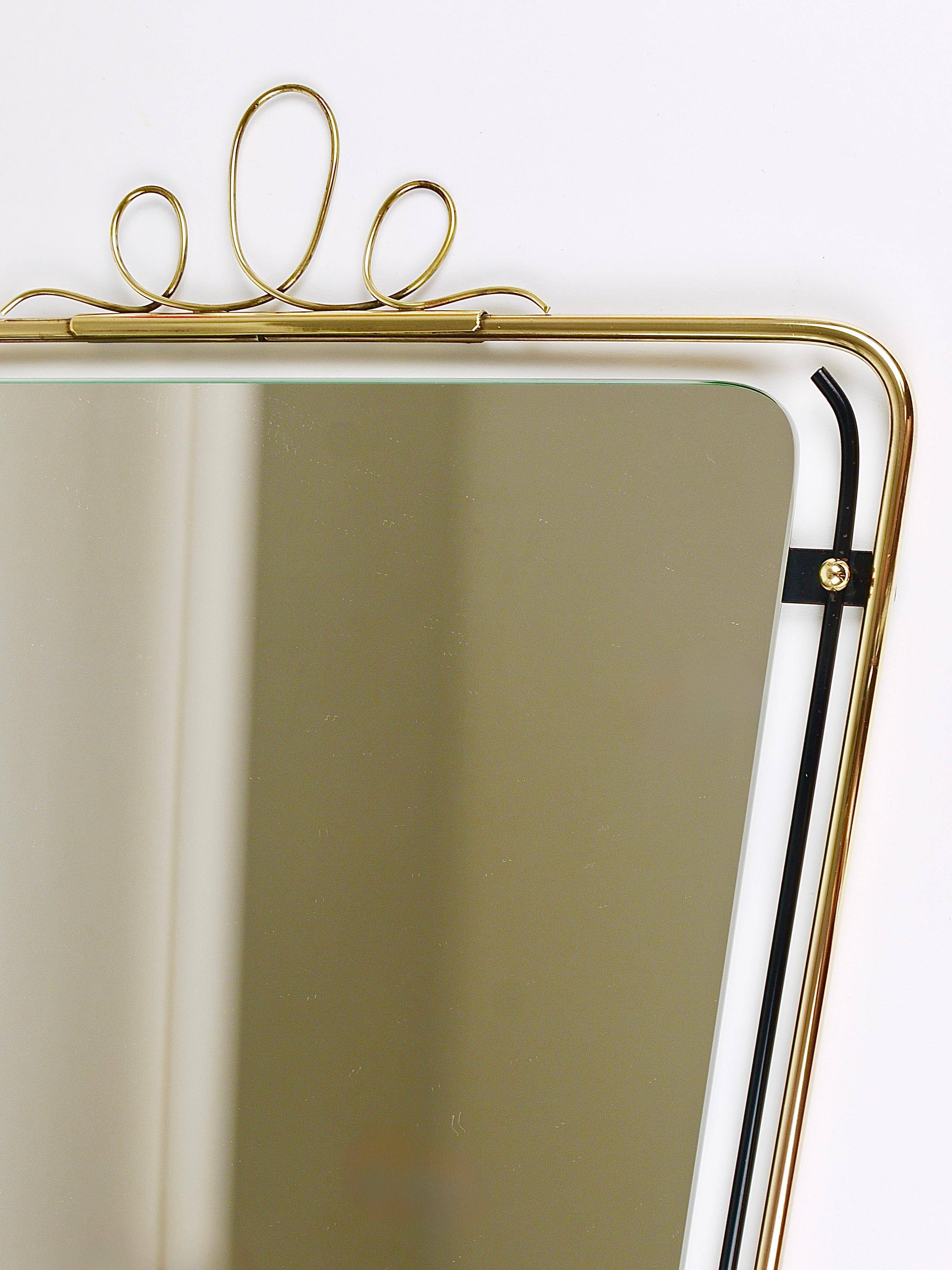 Wall mirror in brass wire with modernist loops from the mid-century, Italy, 1950s.