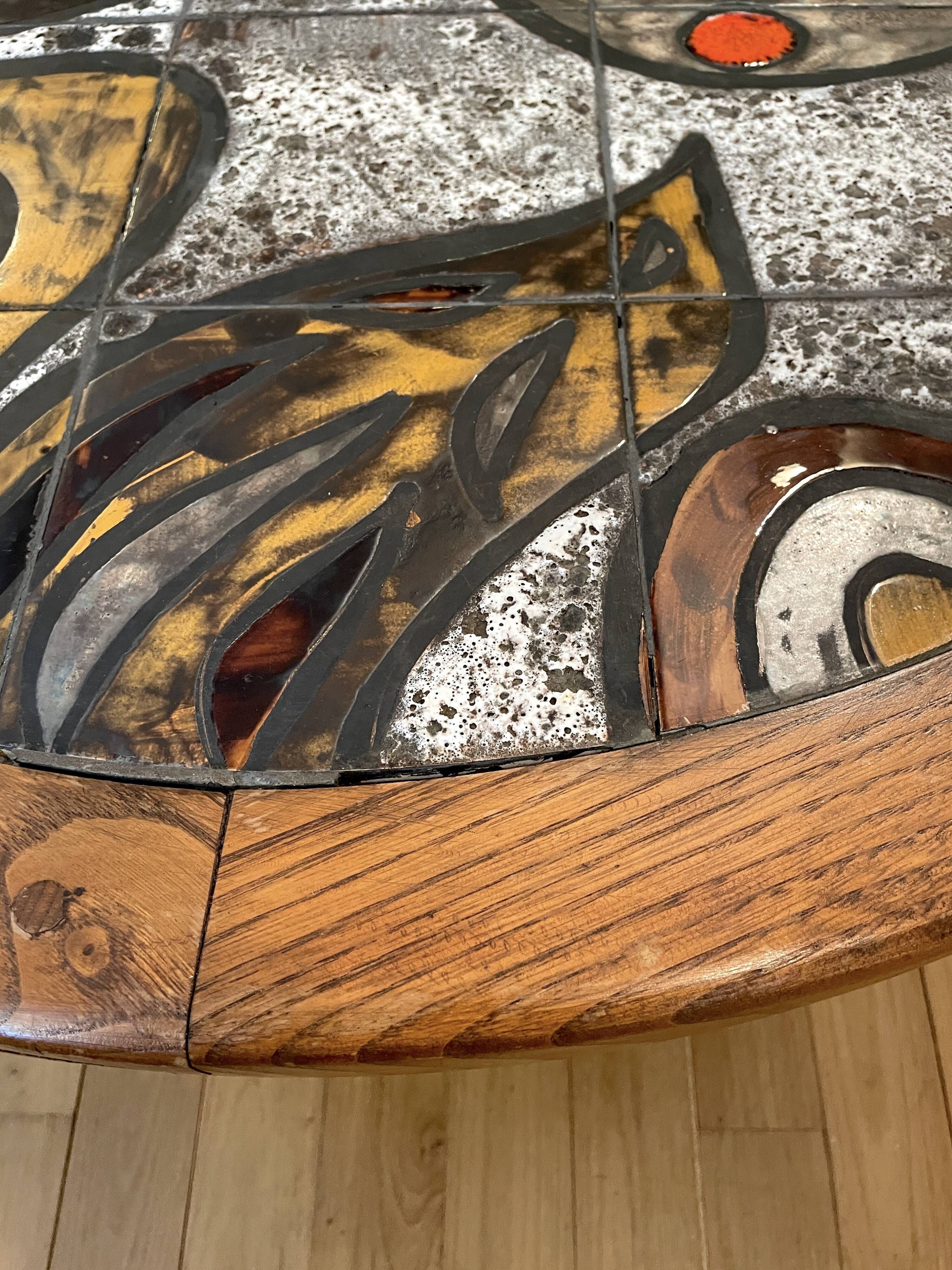 Ceramic coffee table with metal base by G. Reynaud Vallauris