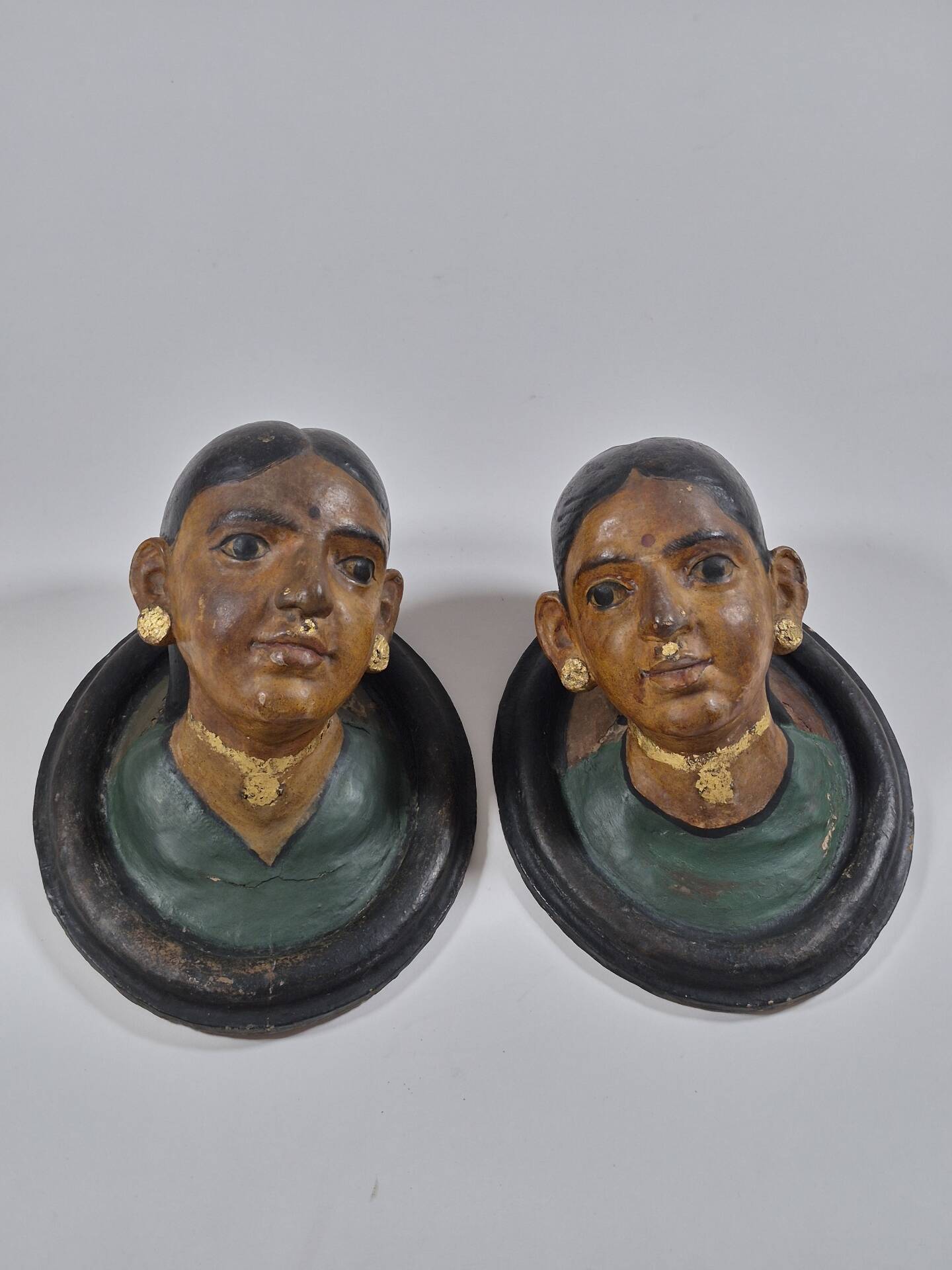 Pair of antique ceramic portrait busts from Rajasthan