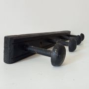 Old wooden wall coat rack