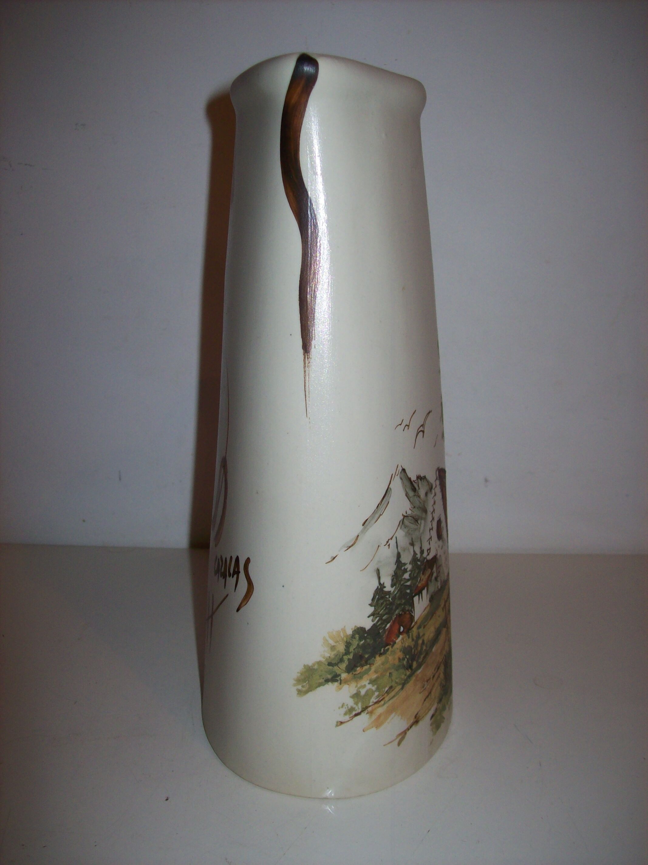 Ceramic pitcher with hand-painted decoration