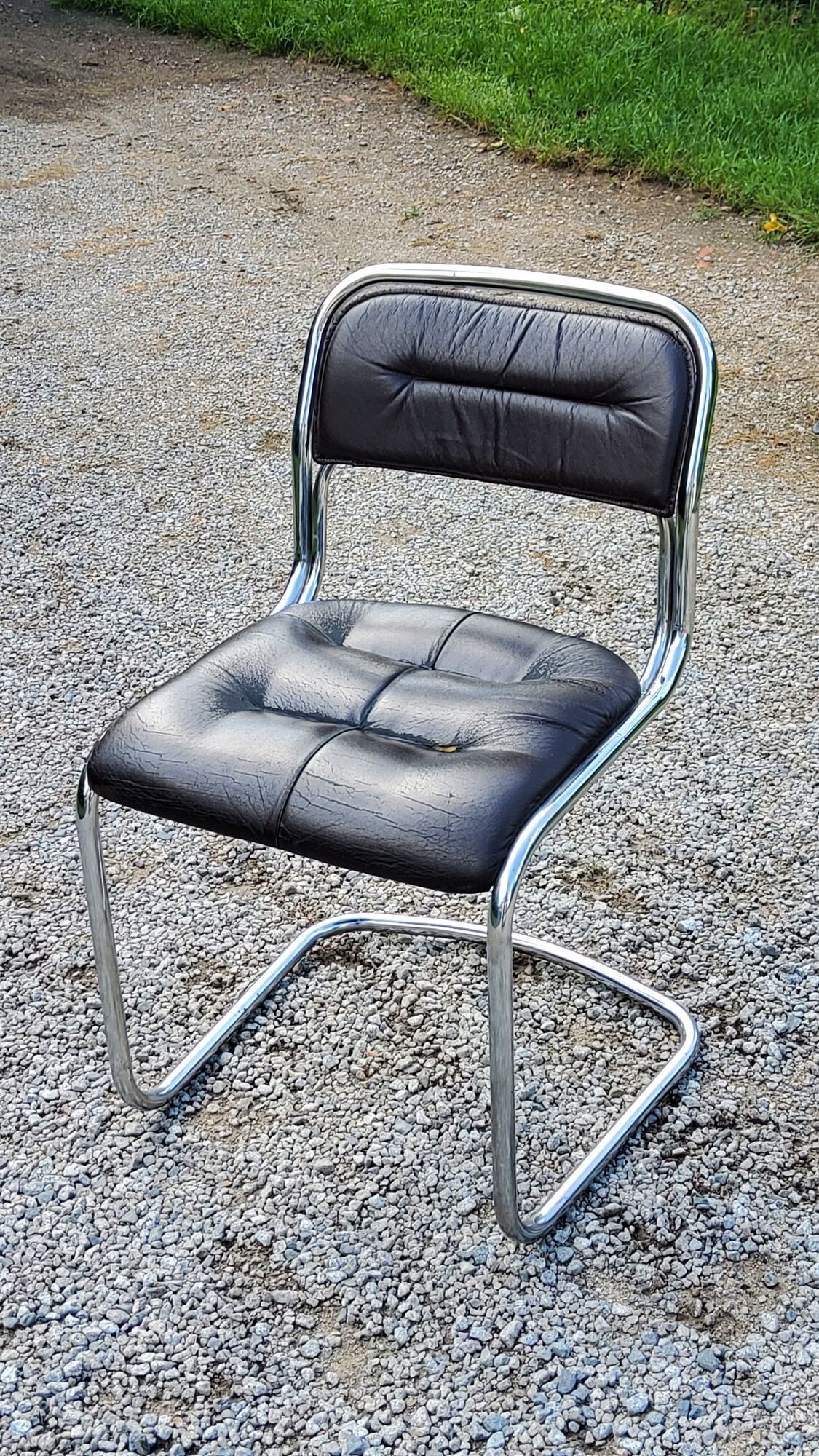 Chair from the 70s in chromed metal and brown moleskine