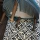 Blue heater with fringed medallion shape