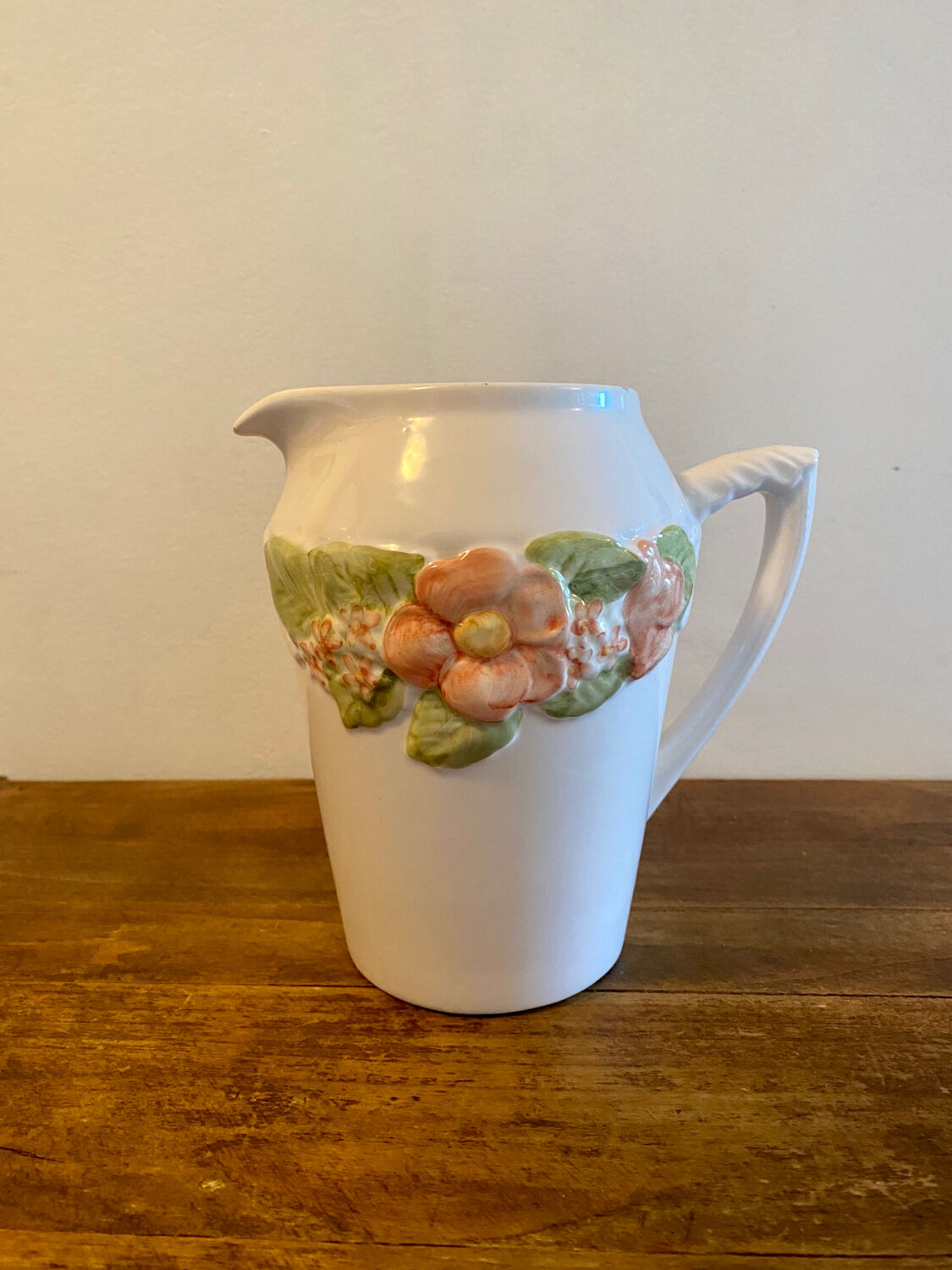 Pretty peach colored flower carafe