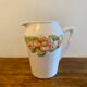 Pretty peach colored flower carafe