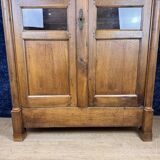 Empire period bookcase in blond walnut circa 1810