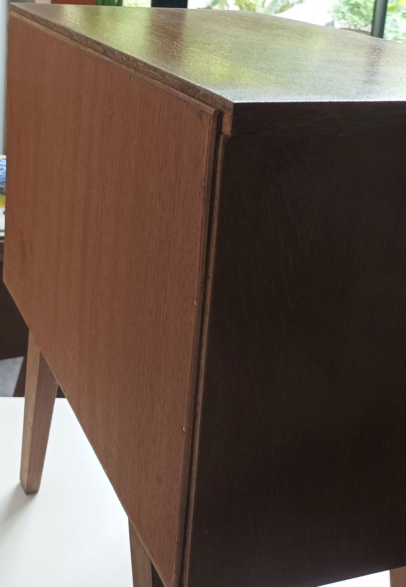 Wooden bedside table with vintage compass legs