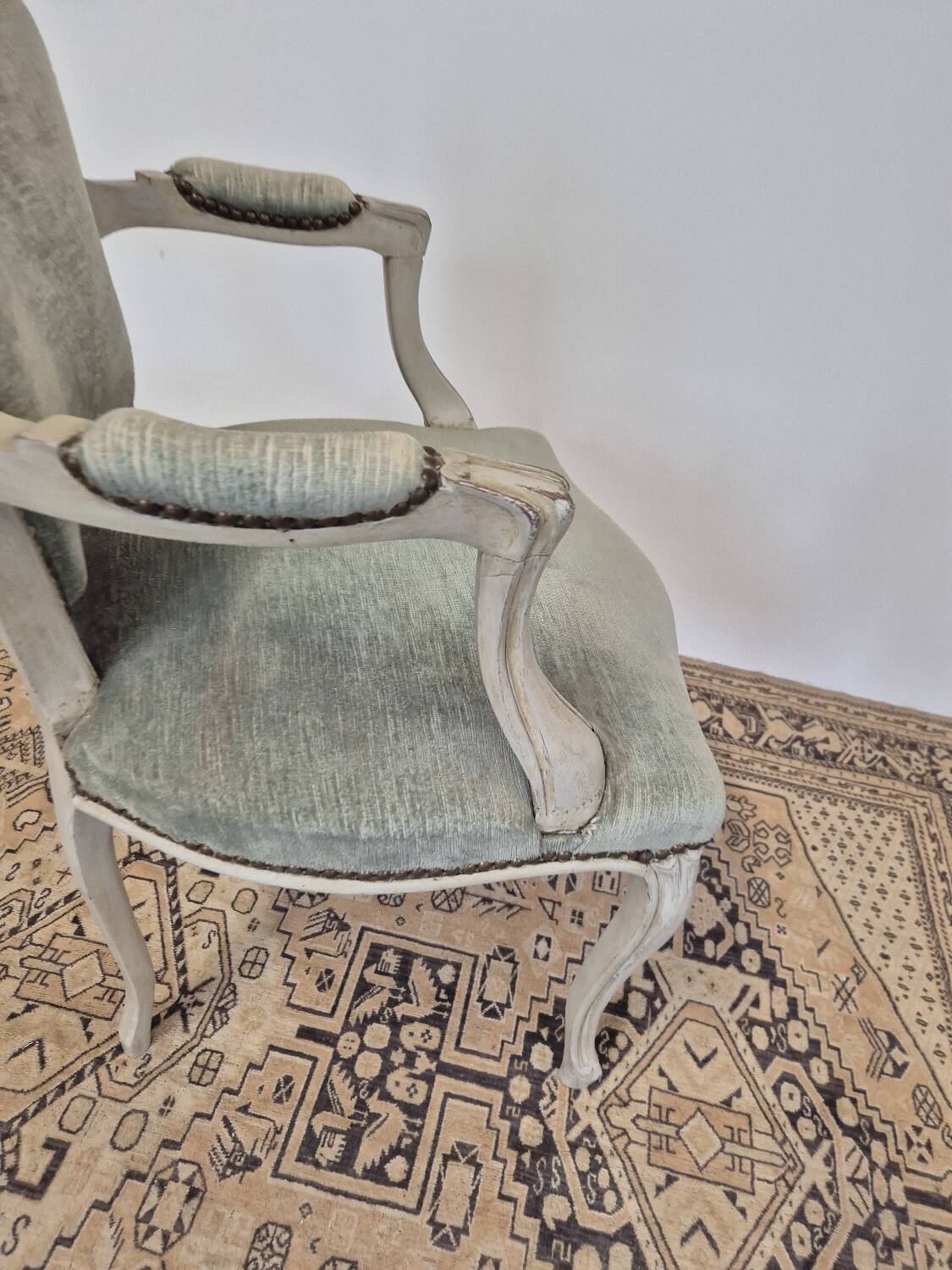 Louis XV style cabriolet armchair in patinated wood and velvet