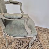 Louis XV style cabriolet armchair in patinated wood and velvet