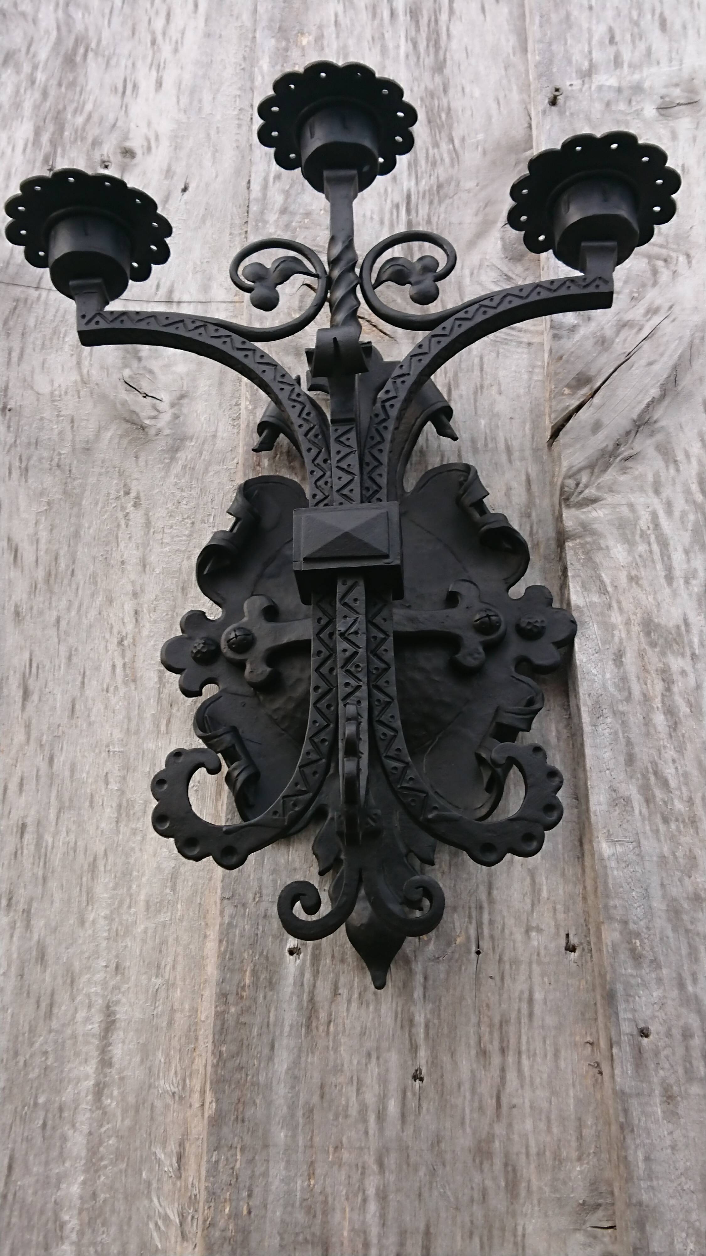 Pair of black wrought iron sconces - neo-Gothic style - from the 1950s