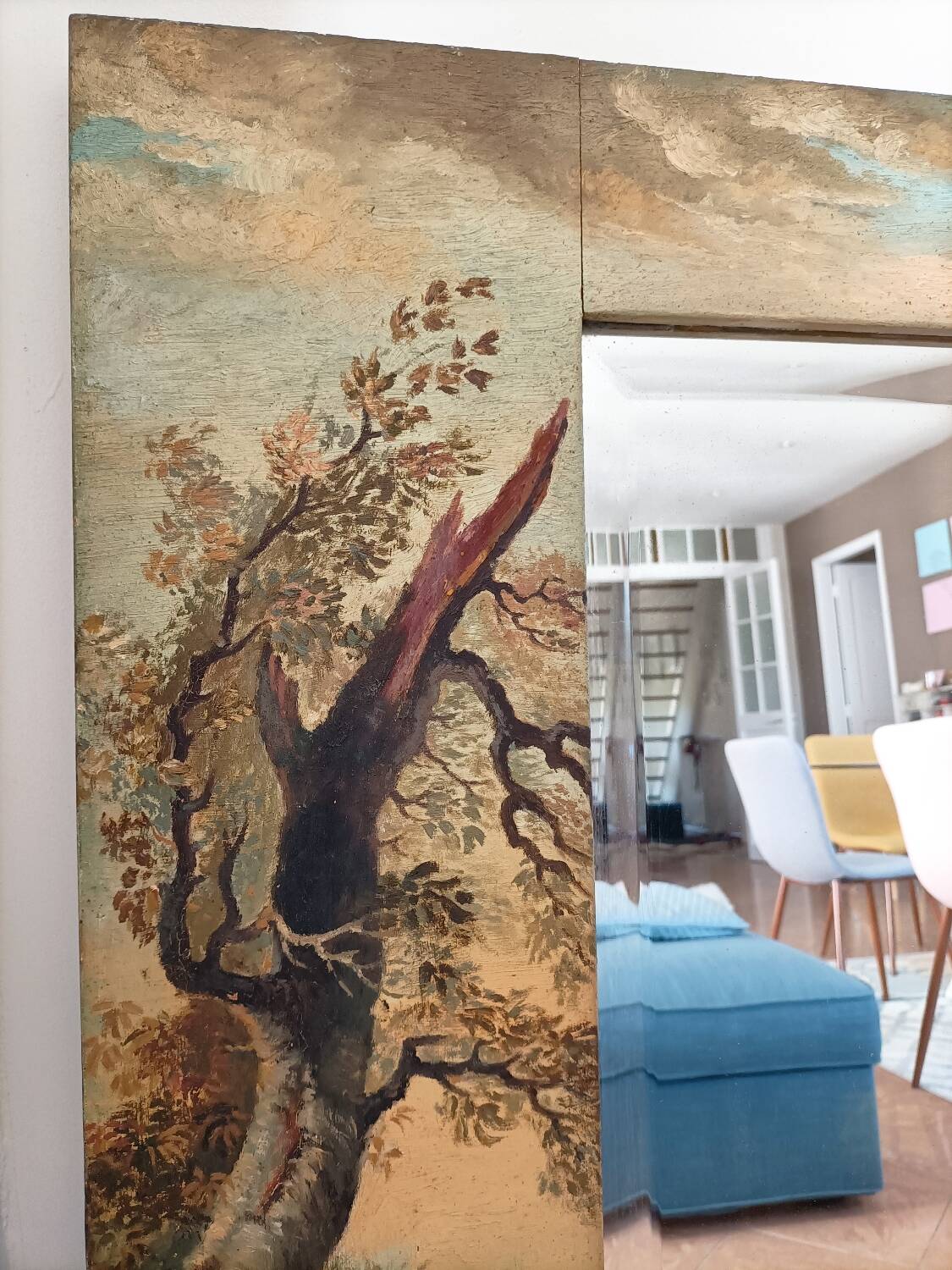 Very large mirror painted in Victorian style.