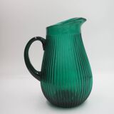 Transparent blue ribbed water jug