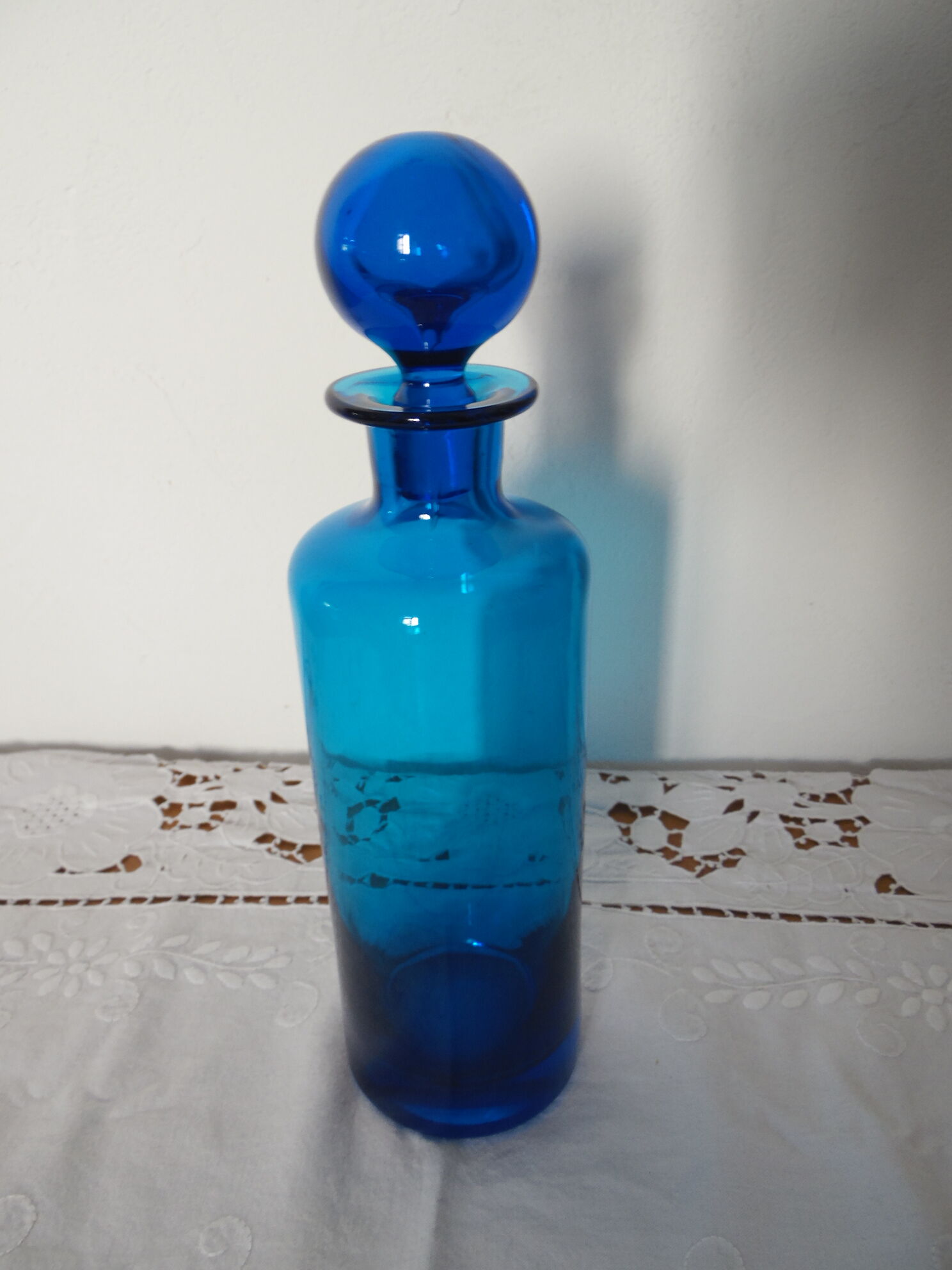 Glass bottle blue ball cap