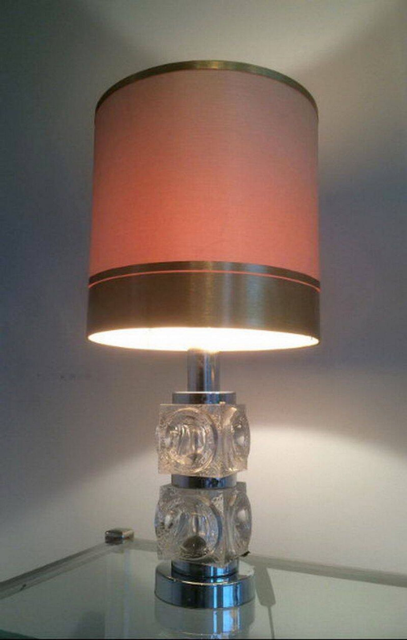 Paire de lampes en verre et chrome. Vers 1970