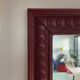 Large antique moulded mirror in wine red / plum (101 x 74 cm)