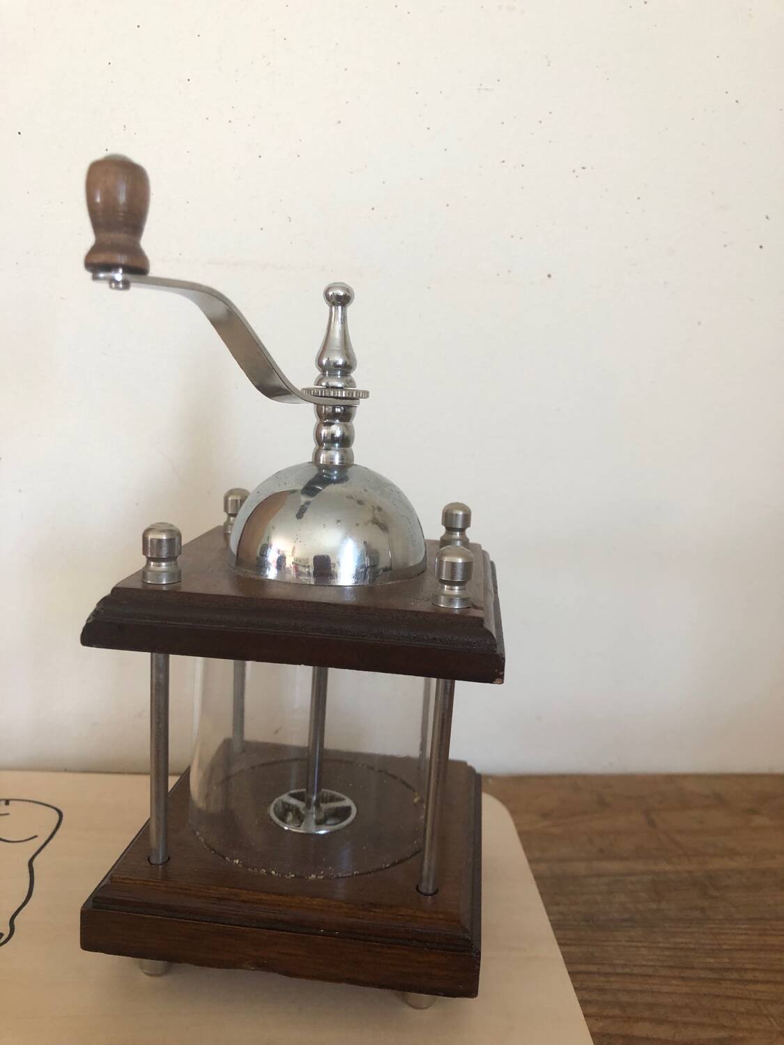 Small old manual pepper or spice mill
