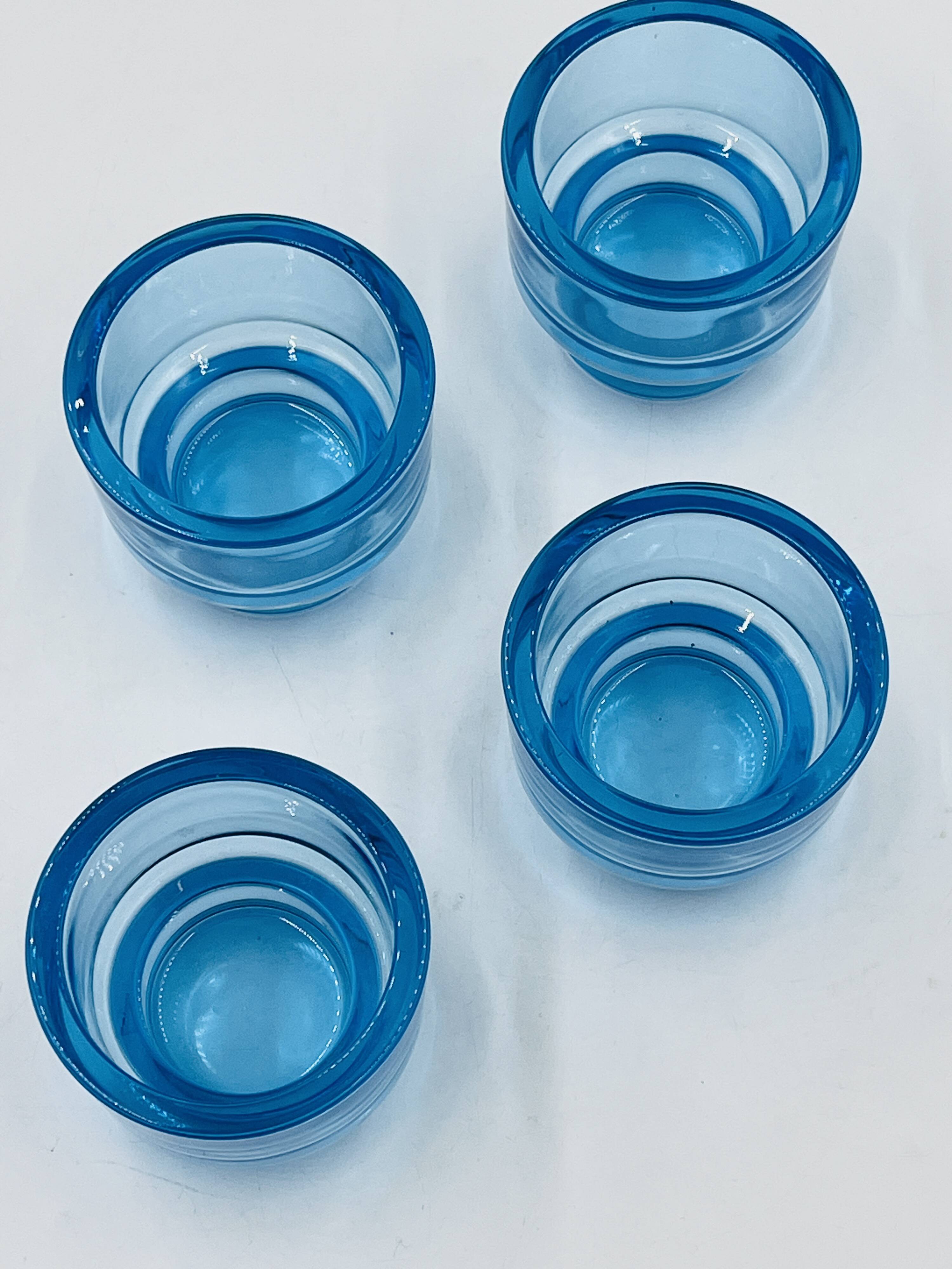 Set of 4 IKEA turquoise aquamarine glass candle holders.