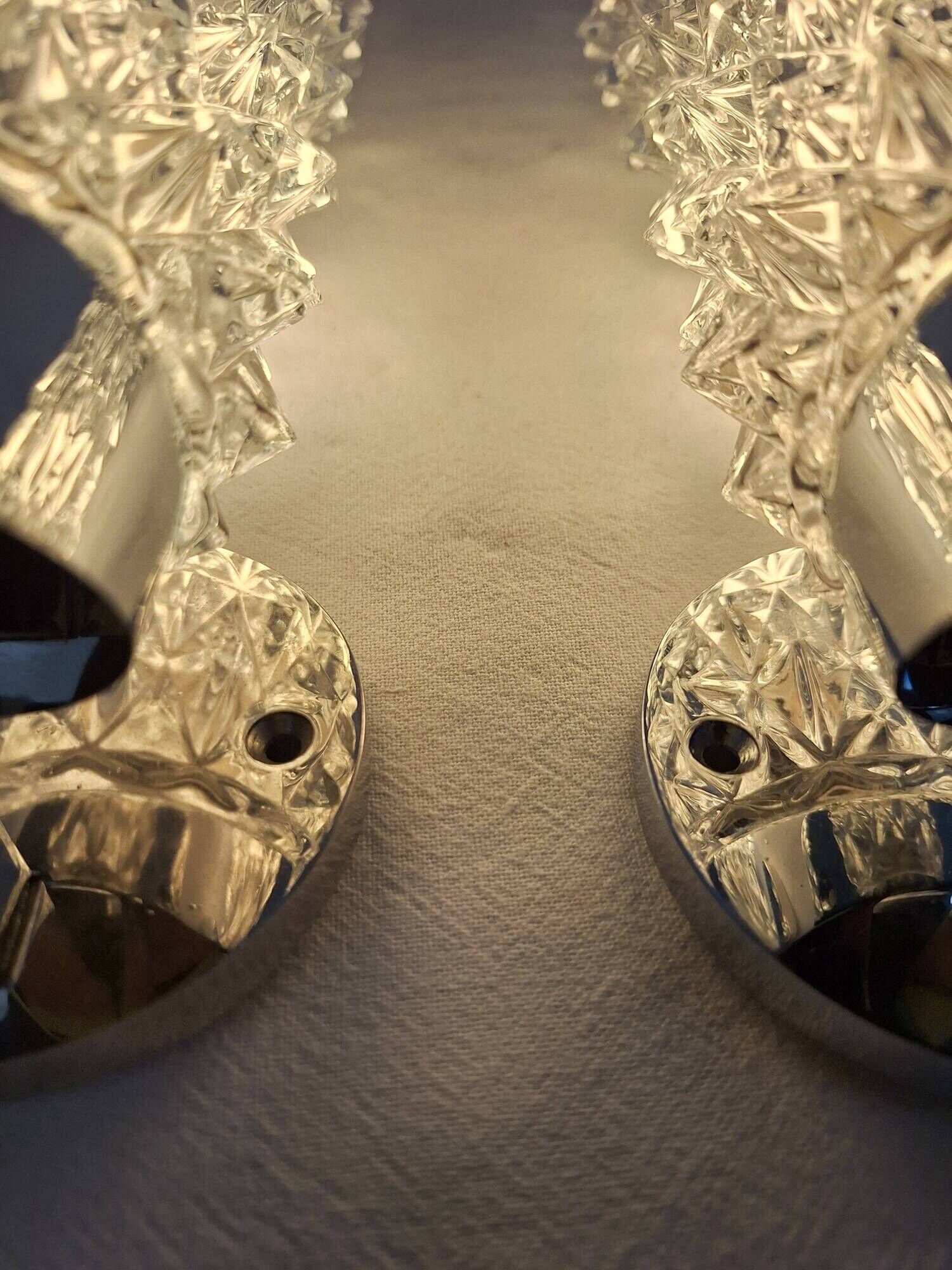 Pair of vintage Art Deco space age chrome and molded glass wall sconces