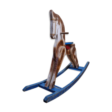 Old rocking horse in painted wood, 50s