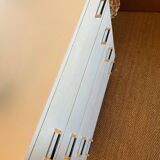Vintage white chest of drawers with compass feet