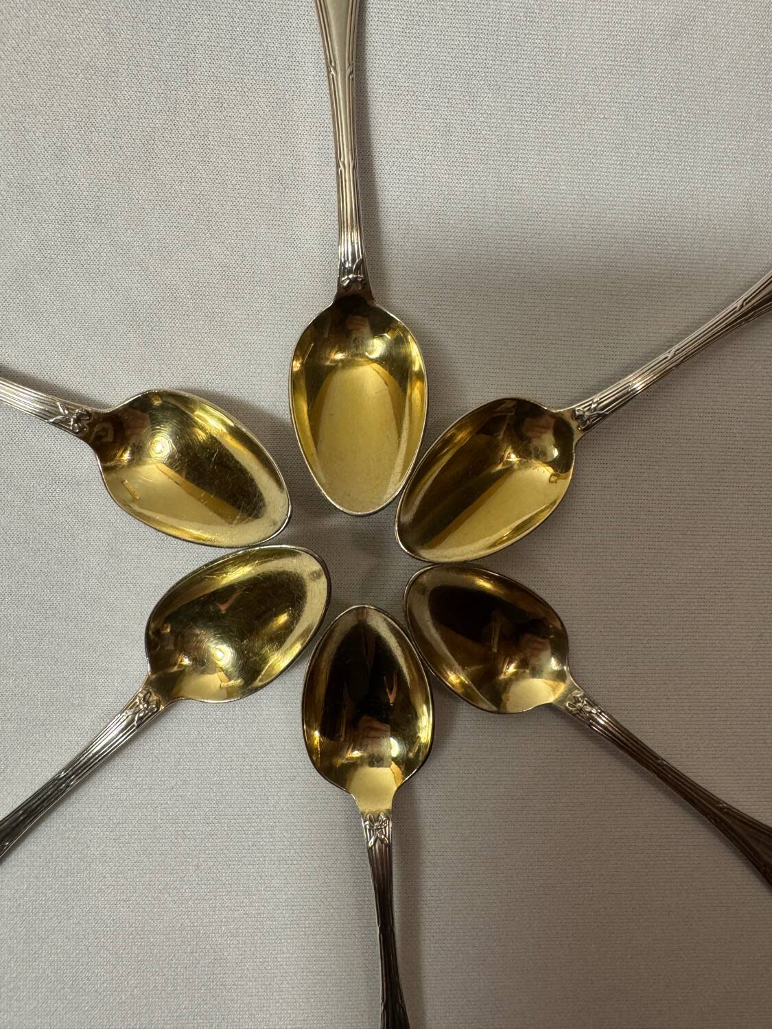 Six Christofle teaspoons, silver-plated vermeil