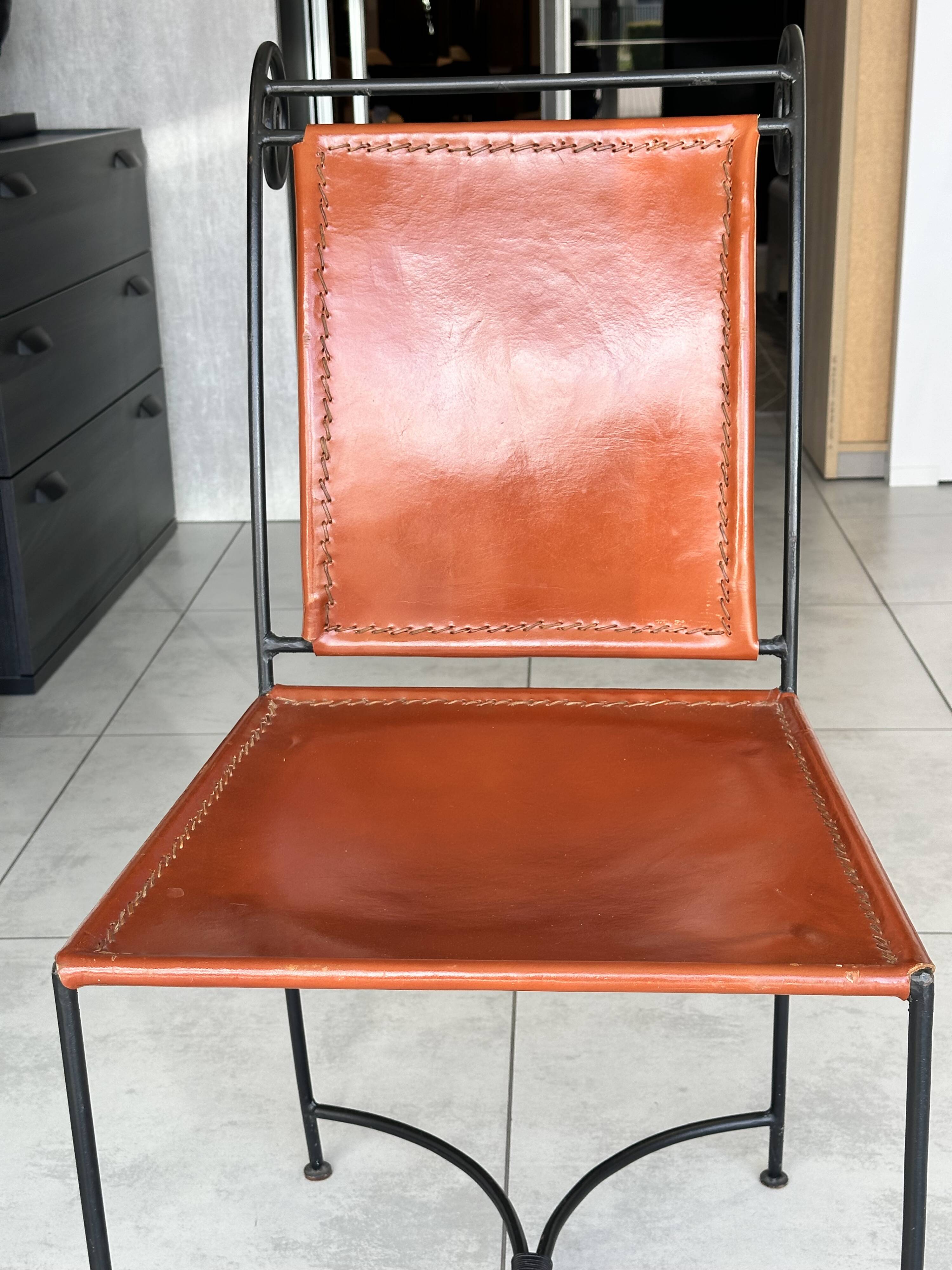 Chair in leather and wrought iron