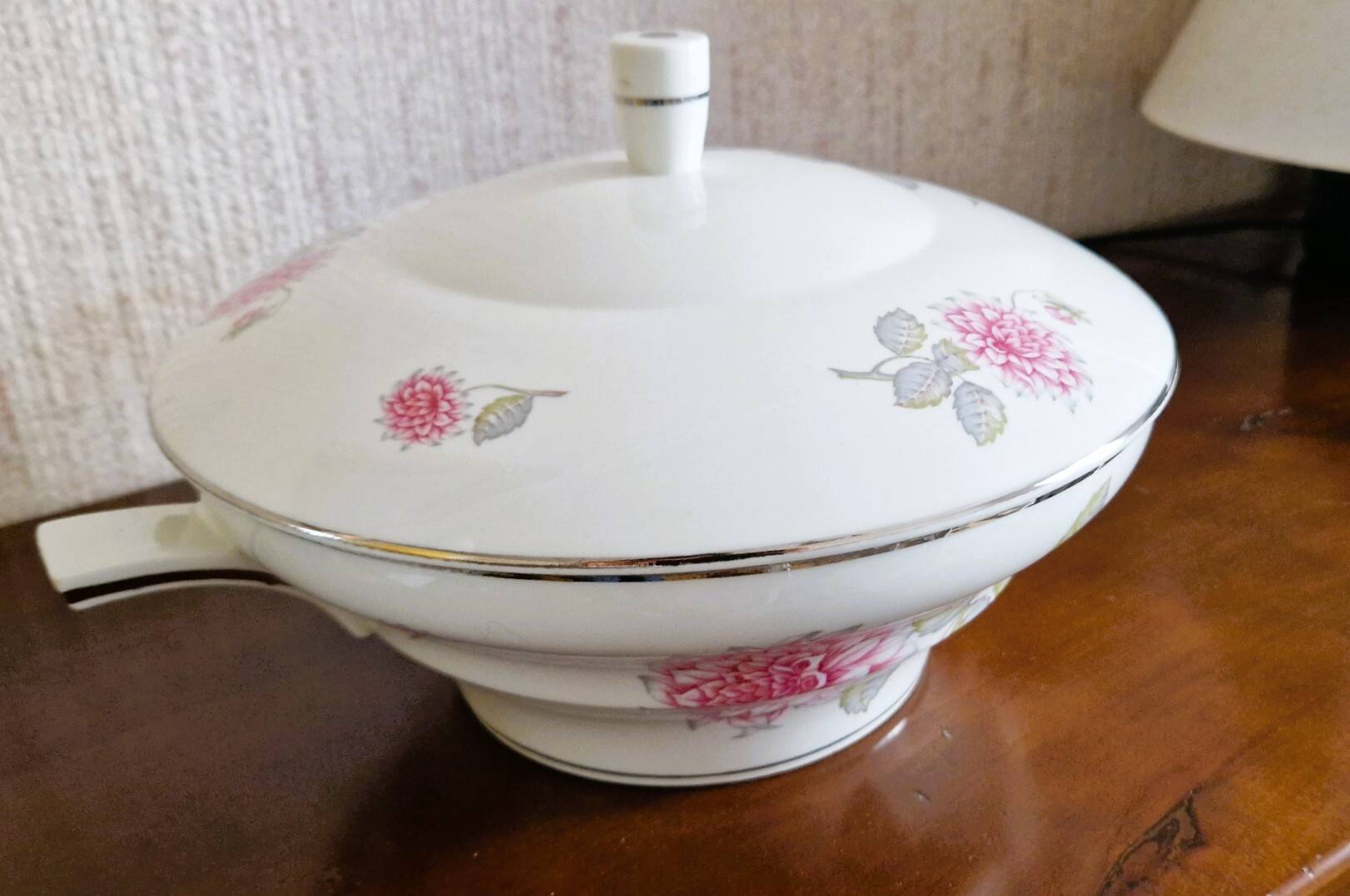 White porcelain soup tureen by Haviland with Dahlia patterns.