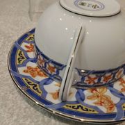 Christofle blue ginkgo porcelain breakfast cup and saucer, 35cl