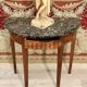 Half-moon console in walnut period Louis XVI around 1770