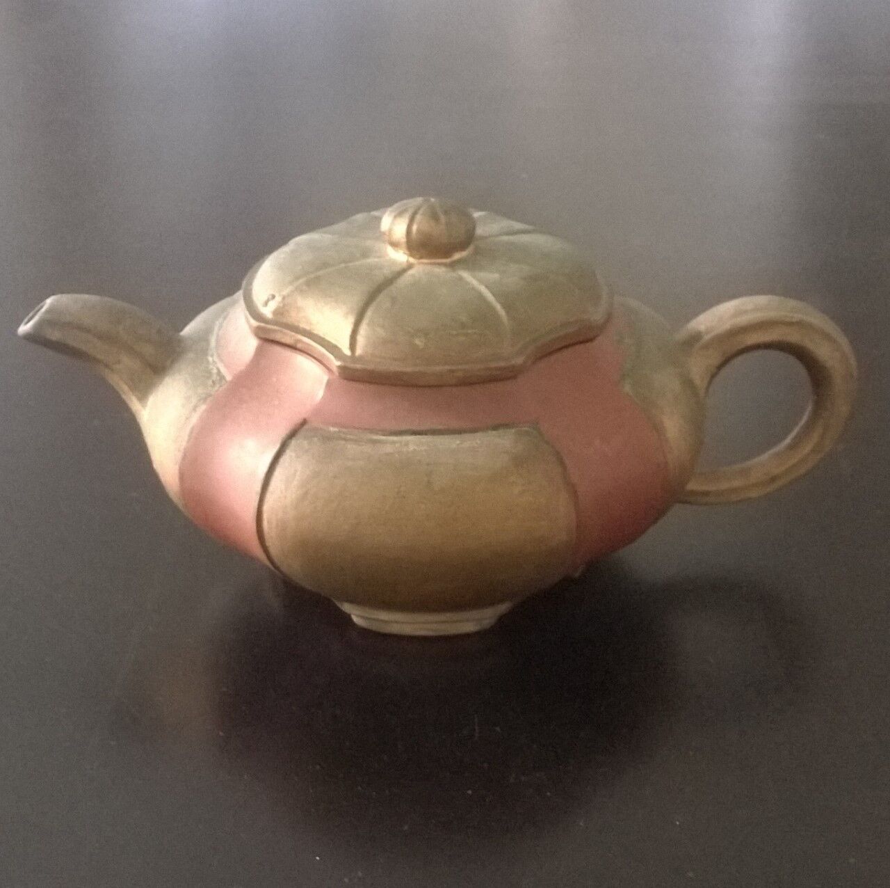 Vintage two-coloured terracotta teapot