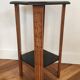 Art Deco console with sculpted black lacquered legs.
