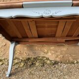 Louis XV style walnut table with a natural wood top.