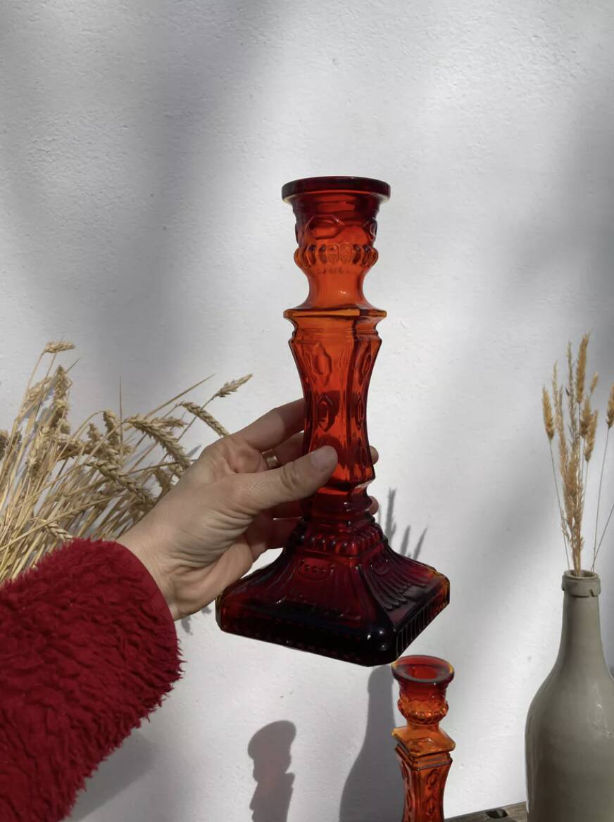 Pair of amber glass candlesticks