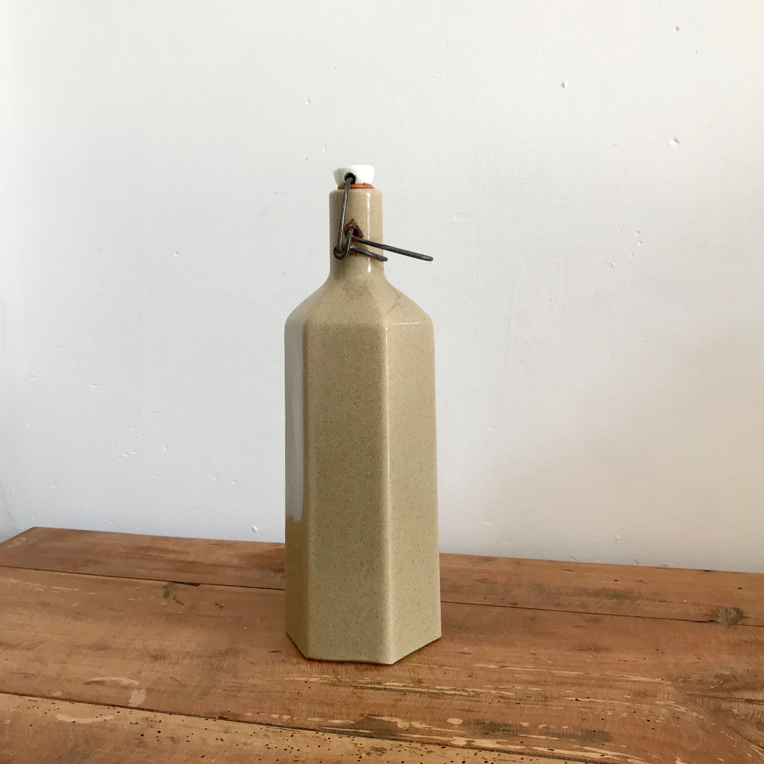 Hexagonal sandstone bottle
