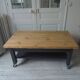Coffee table on casters made from a vintage table, 1 drawer, 1 slate gray shelf.