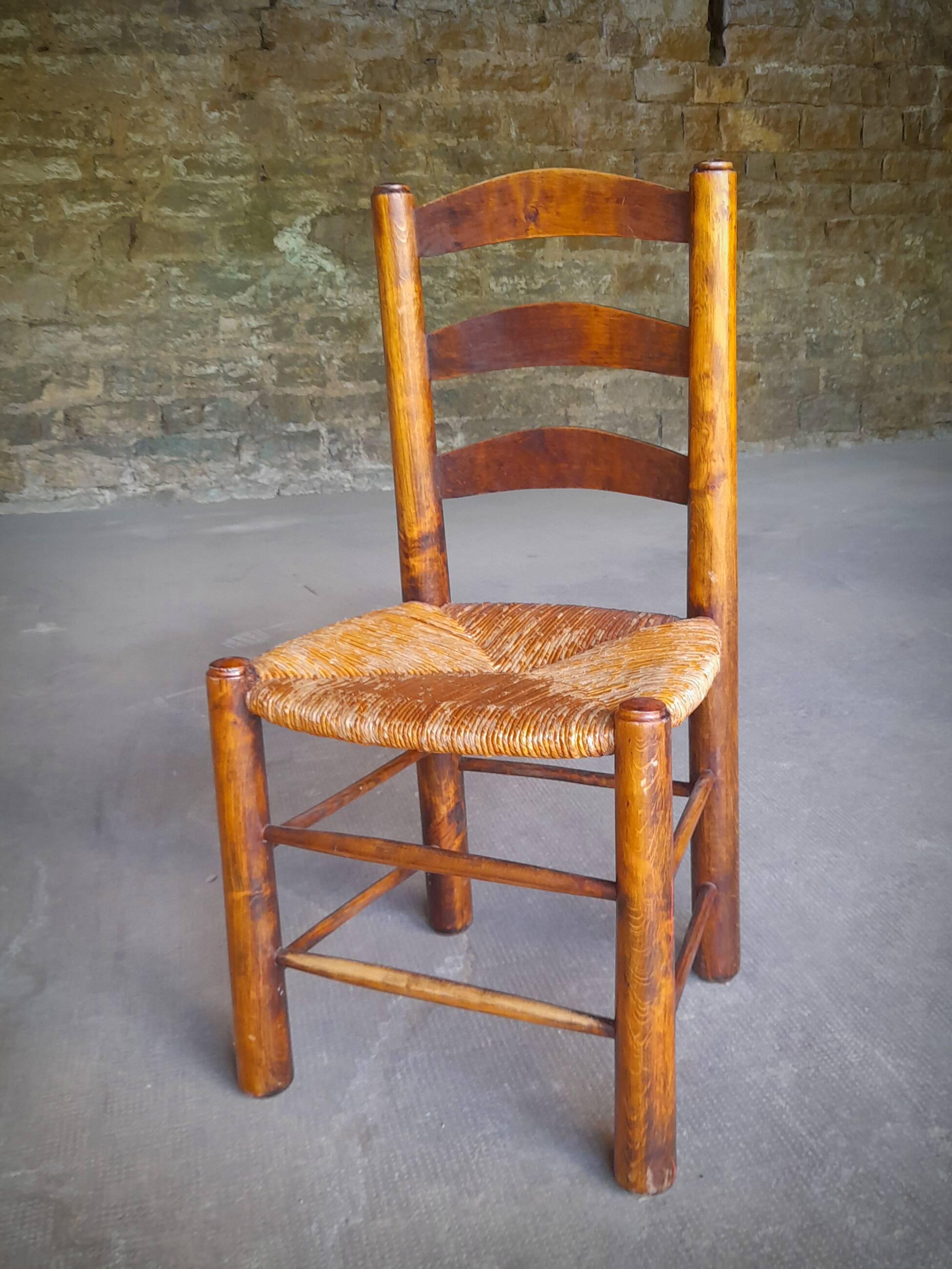 Set of 4 straw-covered brutalist chairs by George Robert