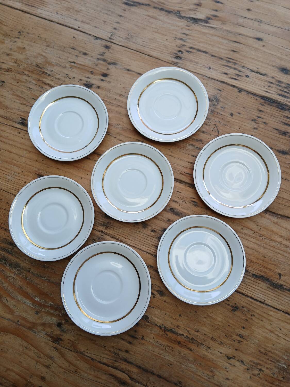 Set of 7 Limoges porcelain cups and saucers