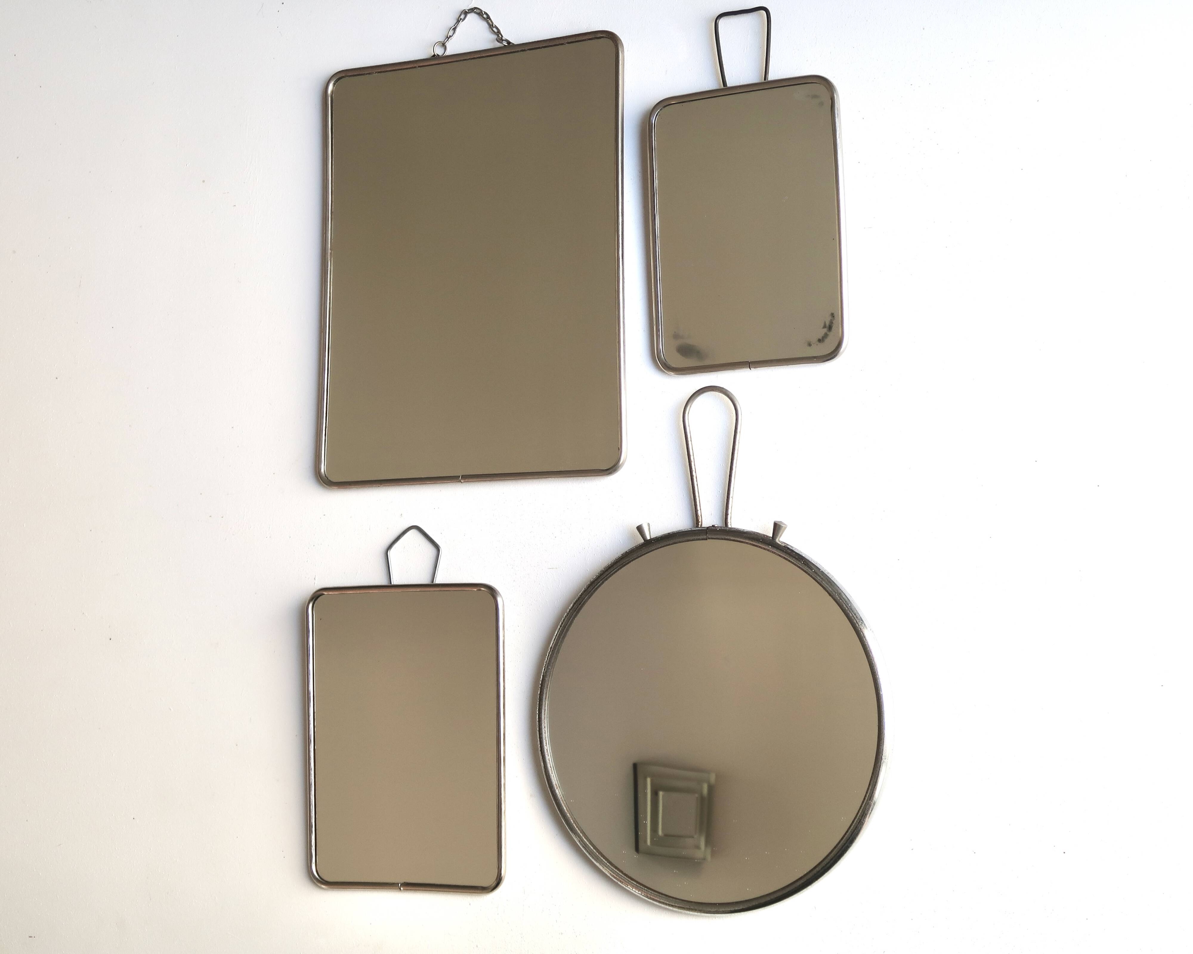 Set of four rectangular and round barber mirrors, 1950s.