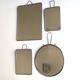 Set of four rectangular and round barber mirrors, 1950s.