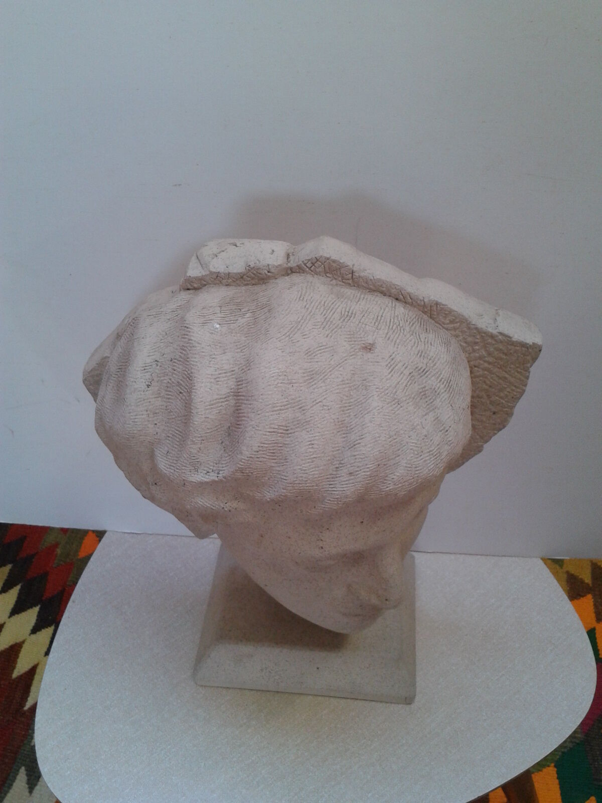 Ephebe head in sandstone