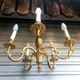 Antique gilded bronze chandelier in Louis XVI style, 5 lights, in working condition.