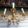Antique gilded bronze chandelier in Louis XVI style, 5 lights, in working condition.