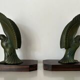 Pair of eagle bookends in green patina regula with rosewood base