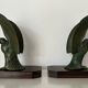Pair of eagle bookends in green patina regula with rosewood base
