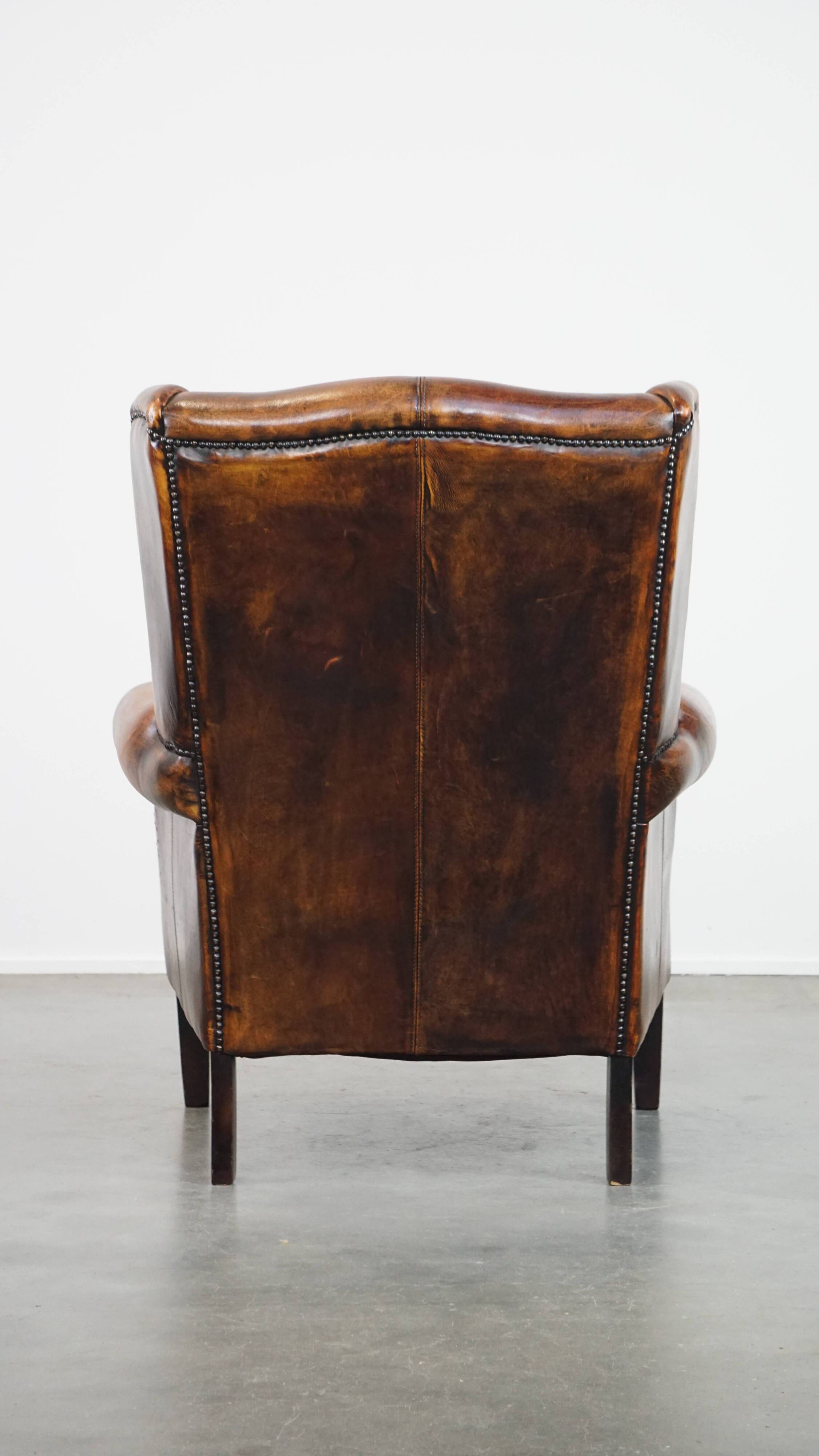 Vintage sheep leather wingback chair