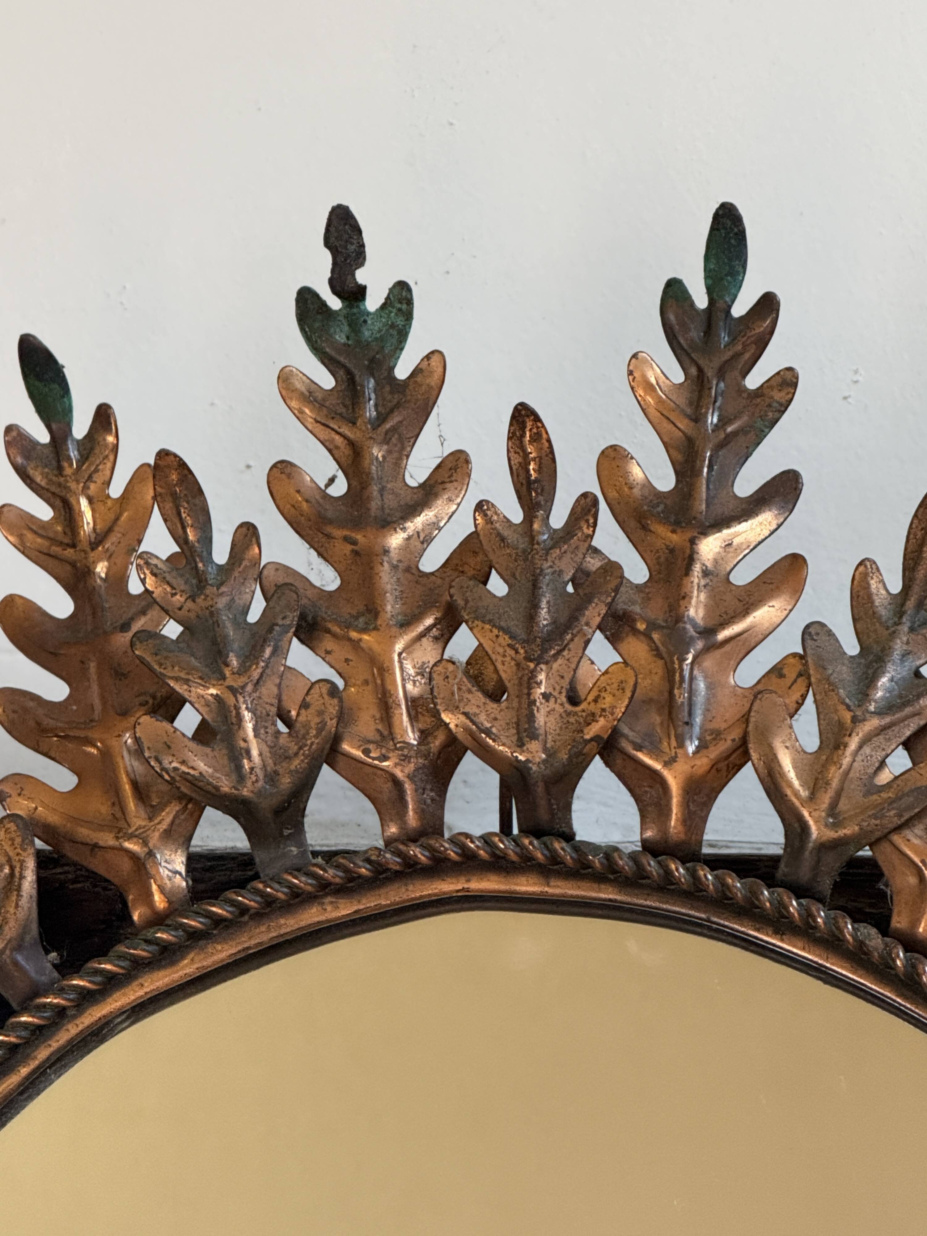 Oval sun mirror wrought iron from the 1950s Italy