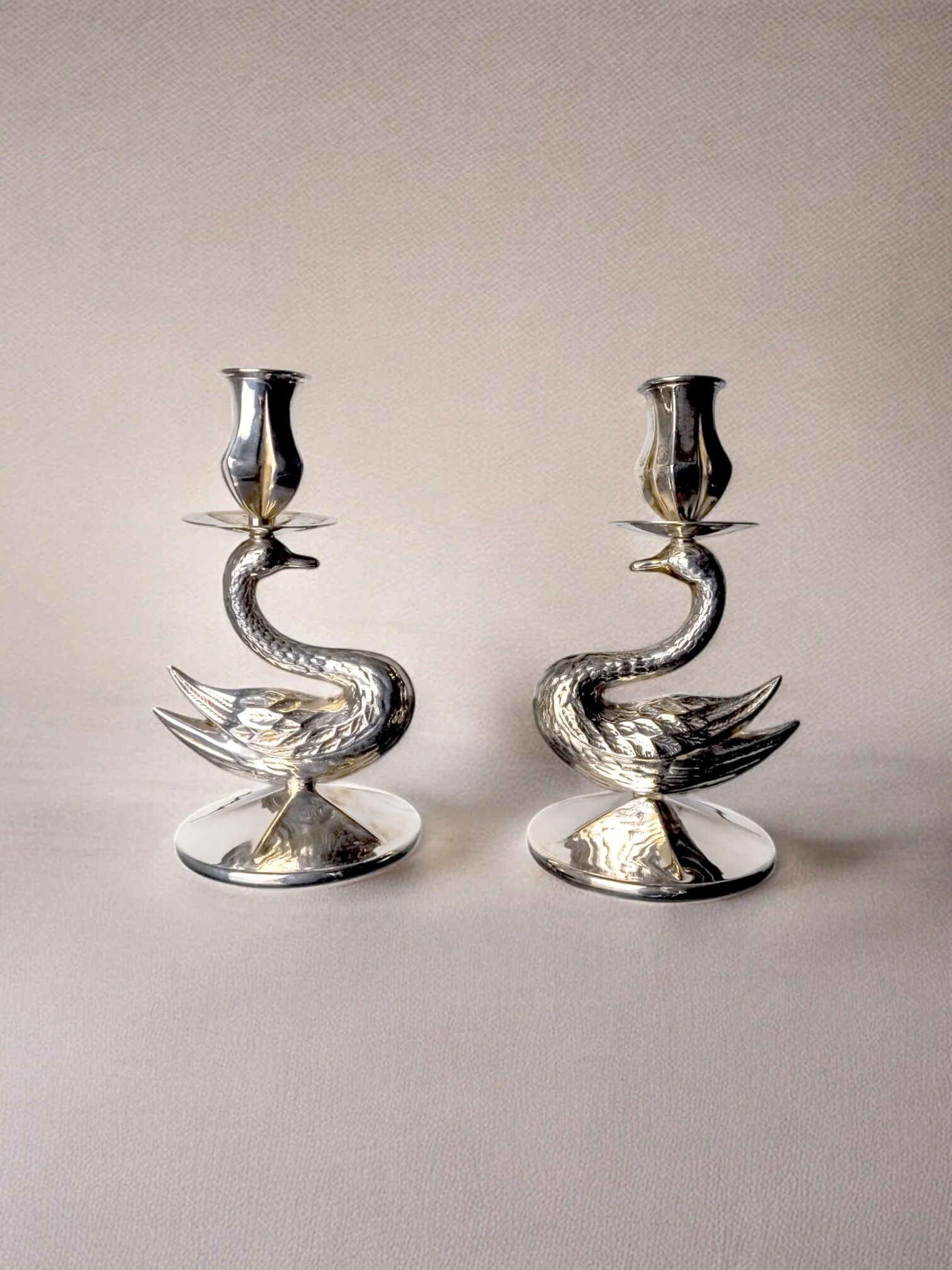 Pair of art deco swan candlesticks in alpaca, Spain, 1970