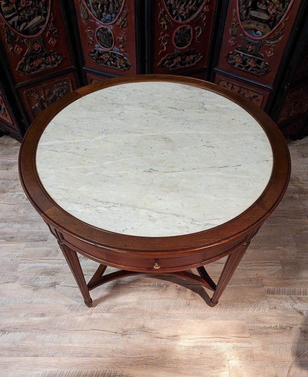 Round mahogany pedestal table Louis XVI