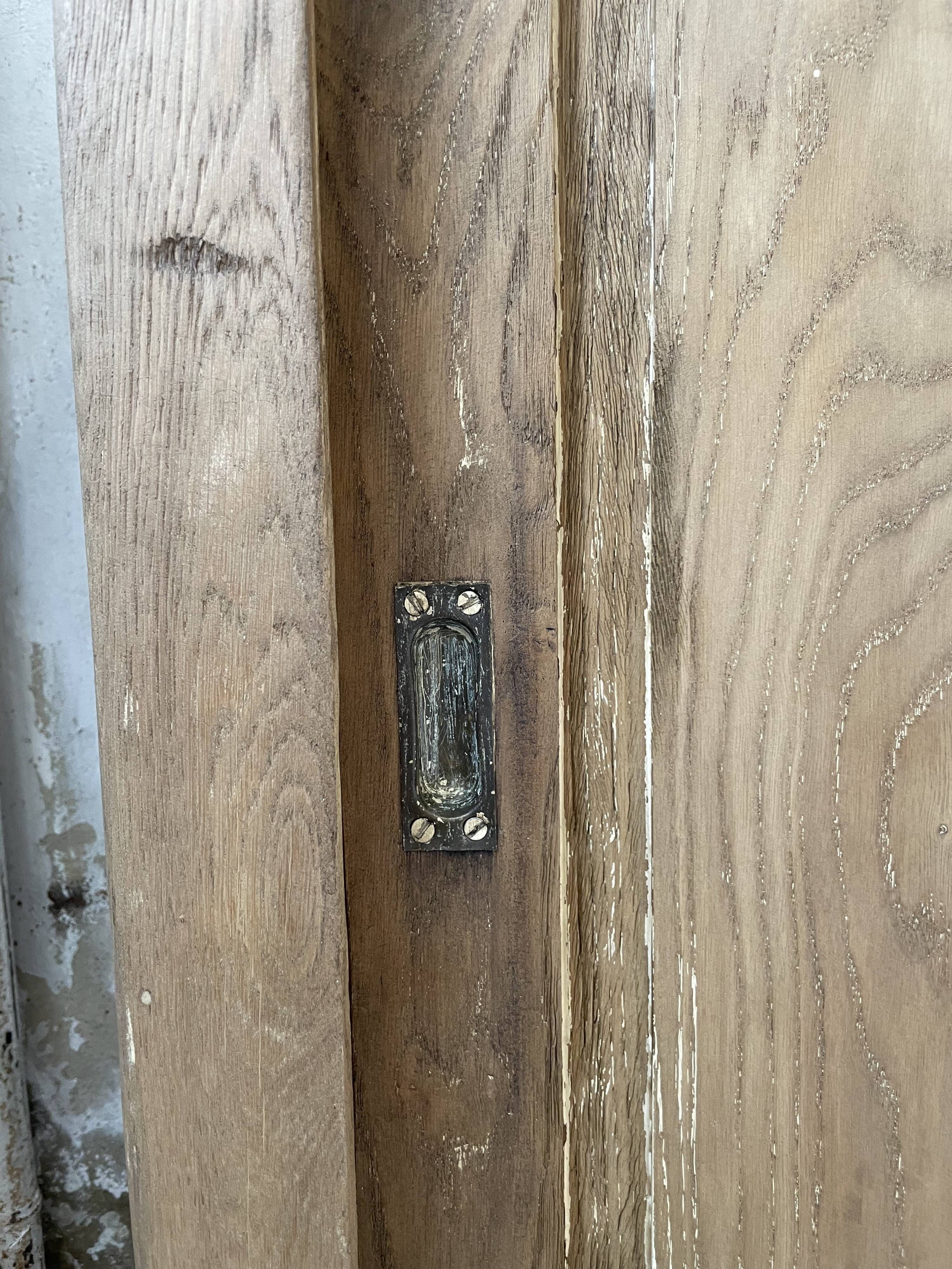 Large row of solid oak loom sliding doors